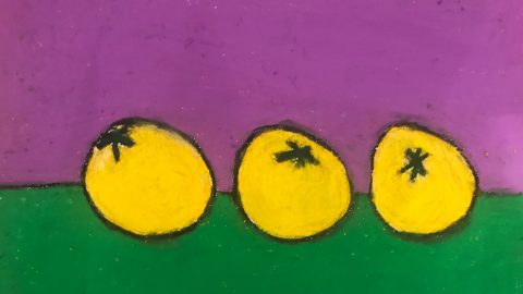 Oil pastel of three yellow tomatoes on a table with purple and green background