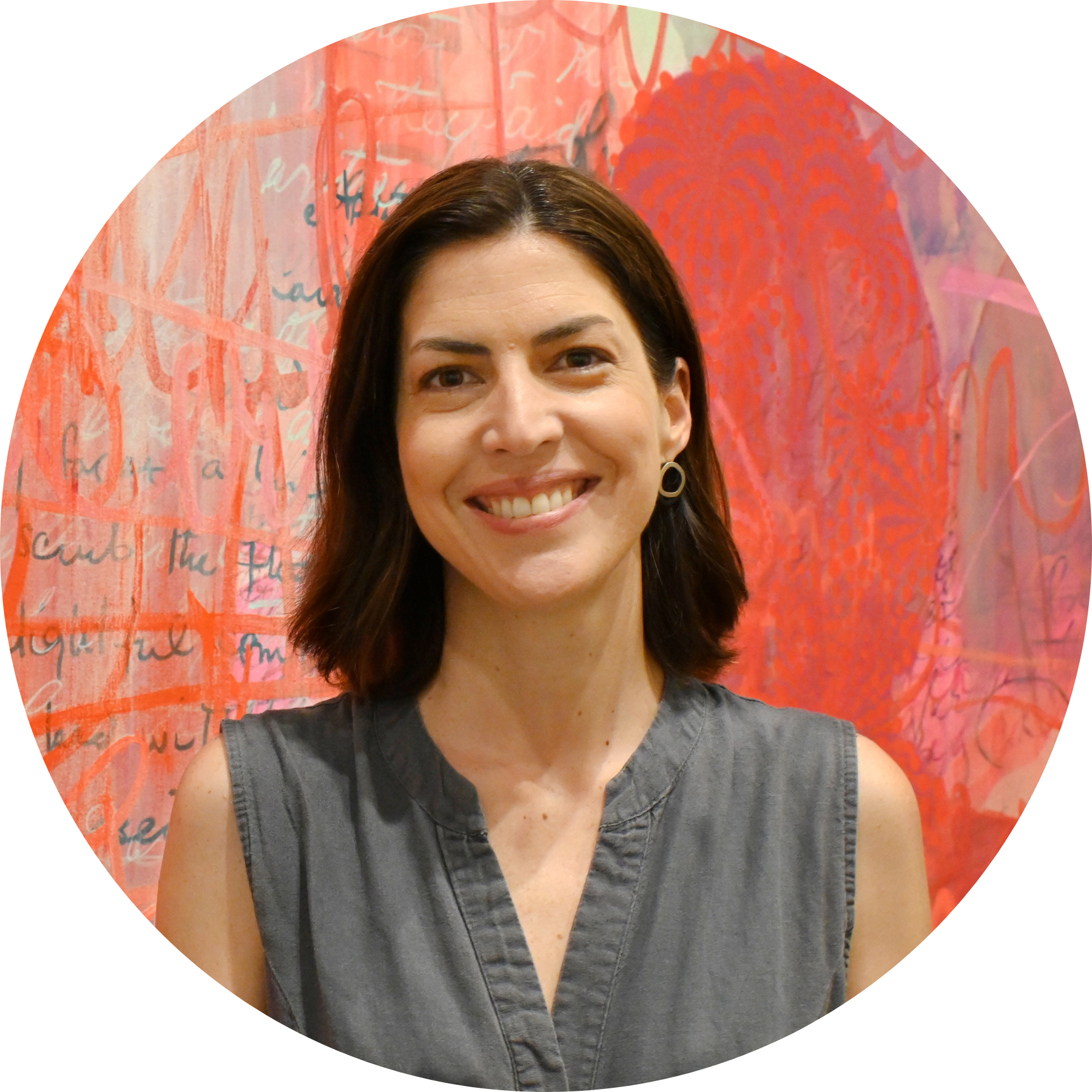 1 a head shot of Nicole Agois, a light skinned Latina woman with shoulder length brown hair smiling at the camera